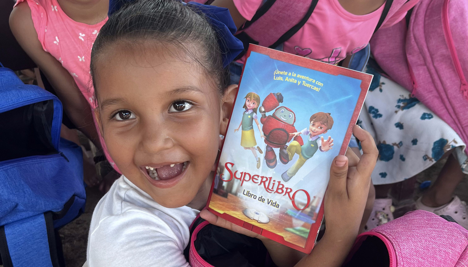 Ana in Mexico holds up her new DVD Spanish version of Superbook, Superlibro!
